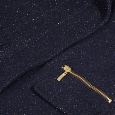 tecido azul escuro com pontos dourados e fecho de correr metálico dourado