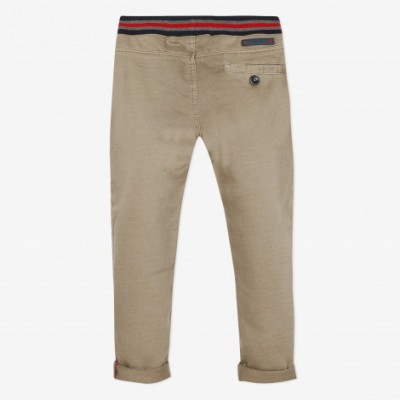 Calças bege para criança com cós elástico listrado e bolso com botão
