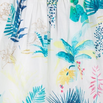 Tecido branco com estampa tropical colorida e pregas superiores
