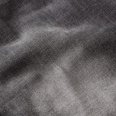 Tecido cinzento com textura suave e padrão liso