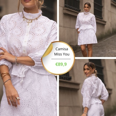 Vestido branco bordado inglês com botões e manga balão em ambiente urbano