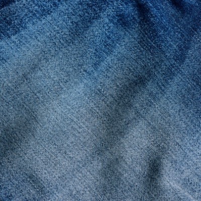 tecido de ganga azul com padrão de trama visível e variações de cor