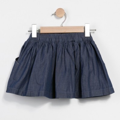 Saia infantil azul escura com padrão de pontos e cintura elástica