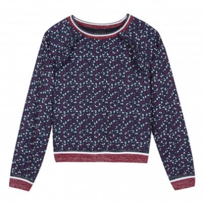 Camisola azul escura com padrão de pontos brancos e azuis e detalhes vermelhos