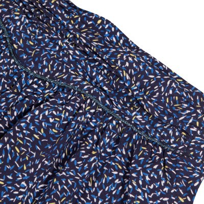 tecido azul escuro com padrão abstrato em branco, azul claro e amarelo