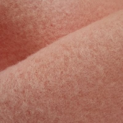 Tecido felpudo cor-de-rosa claro com costura