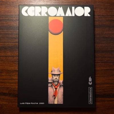 Capa de livro preta com título branco e ilustração vertical amarela central com figuras humanas.