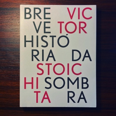 Capa de livro com texto em preto e vermelho sobre fundo branco