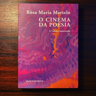 Capa do livro O CINEMA DA POESIA com design abstrato em roxo e laranja