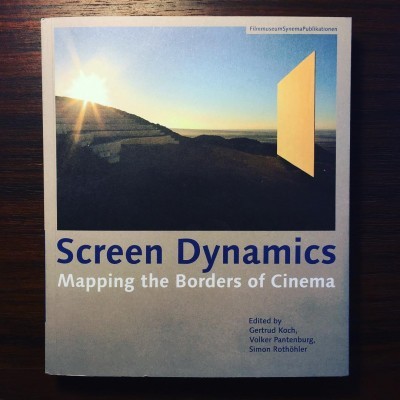 Capa do livro Screen Dynamics com paisagem ao nascer do sol e texto do título e editores.