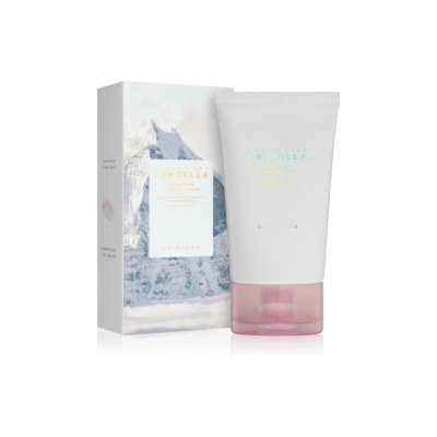 Creme facial em tubo branco com tampa rosa claro e caixa com imagem de montanha.