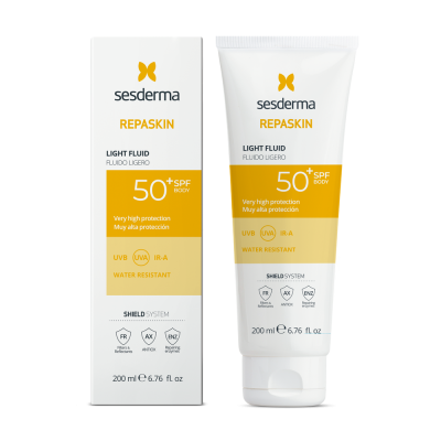 Creme fluido leve Repaskin SPF 50+ da Sesderma em embalagem e tubo branco com detalhes amarelos