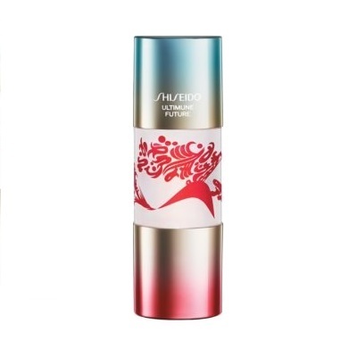 Embalagem cilíndrica metálica de produto Shiseido com padrão floral vermelho.