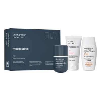 Conjunto dermamelan home pack da mesoestetic com três frascos e embalagem cinzenta.