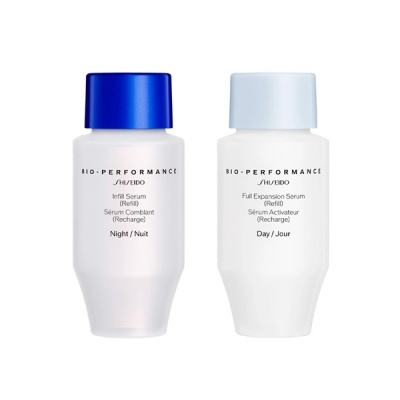 Duas embalagens de serums SHISEIDO BIO-PERFORMANCE, uma azul escura Night e outra azul clara Day