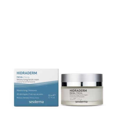 Creme facial Hidraderm da Sesderma em caixa azul e branca ao lado do frasco de vidro fosco com tampa prateada