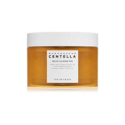 Frasco plástico âmbar com tampa branca e rótulo branco contendo discos de algodão