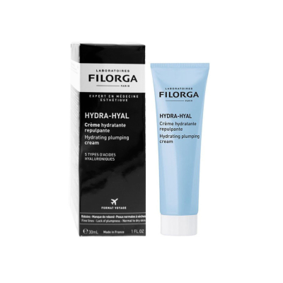 Creme hidratante Hydra-Hyal da FILORGA com embalagem preta e branca e tubo azul claro