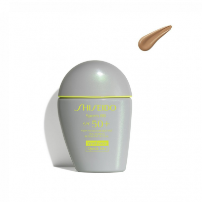 Frasco de creme Shiseido Sports BB cinzento com texto amarelo e amostra de creme bege castanho