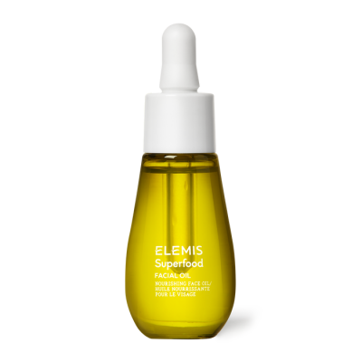 Frasco amarelo com conta-gotas branco de óleo facial ELEMIS Superfood