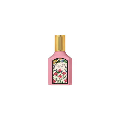 Frasco rosa com tampa dourada e etiqueta floral Gucci Flora