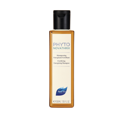 Frasco amarelo de shampoo Phyto Novathrix com tampa preta