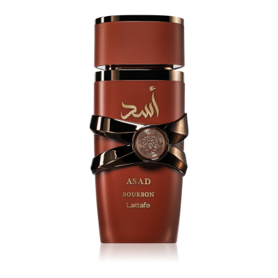 Frasco de perfume castanho avermelhado com detalhes dourados e fita decorativa