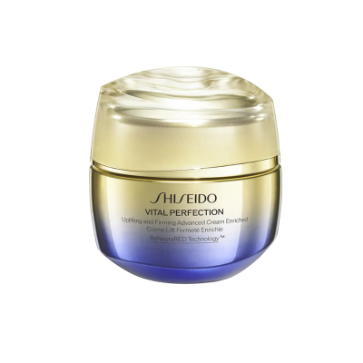 Frasco de creme Shiseido Vital Perfection com embalagem dourada e azul