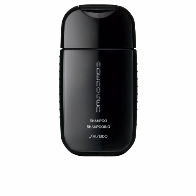 Frasco preto de shampoo Shiseido Adenogen com tampa
