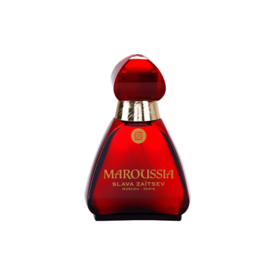 Frasco de perfume vermelho translúcido com tampa vermelha e detalhes dourados