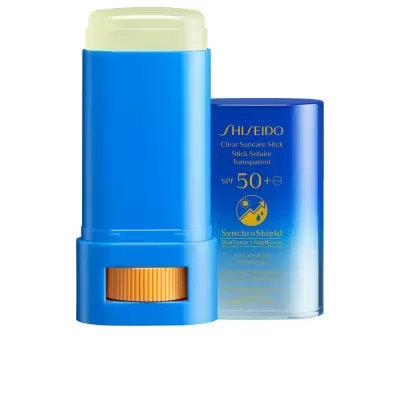 Protetor solar em stick azul da Shiseido com texto dourado