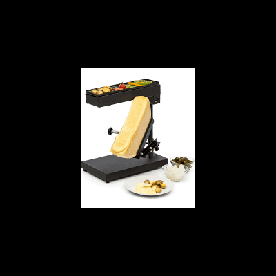 Caixa preta aberta com chocolates coloridos e almofada amarela, com pratos de frutas e castanhas