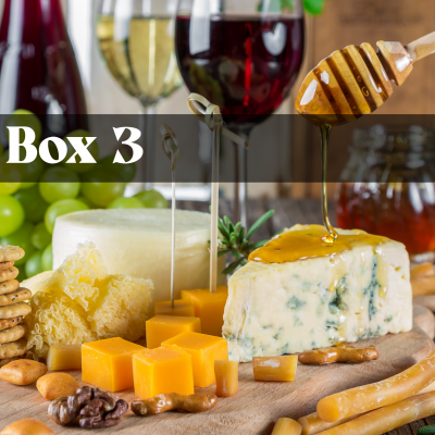 Tabua com queijos, nozes, mel, uvas e vinho com texto 'Box 3'