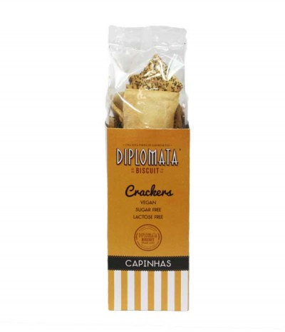 Pacote de crackers vegan sem açúcar e lactose da marca DIPLOMATA BISCUIT com embalagem laranja e listras brancas e laranjas