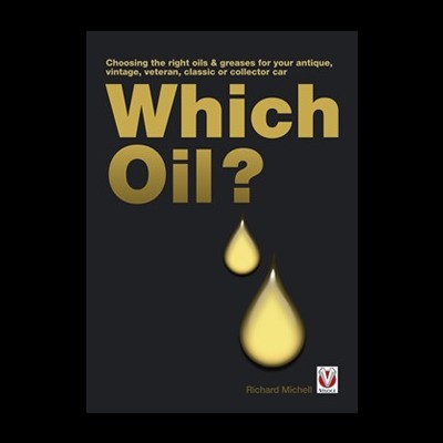 Capa de livro com texto dourado e gotas de óleo