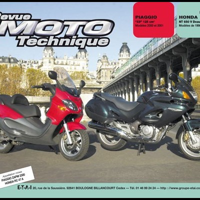 Capa de revista técnica com motos vermelha e preta em cenário urbano