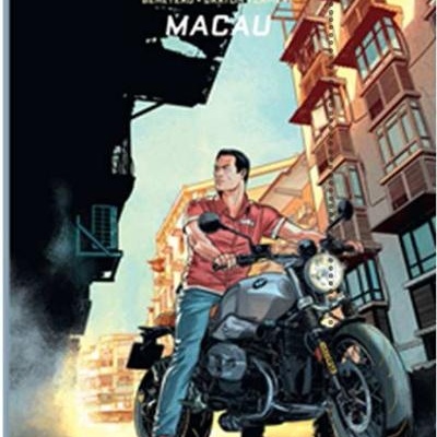 Capa de banda desenhada Michel Vaillant com homem em mota preta em contexto urbano