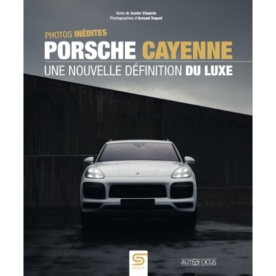 Revista com Porsche Cayenne prateado e texto em francês sobre luxo.