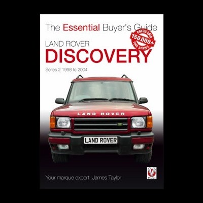 Carro Land Rover Discovery vermelho visto de frente com texto promocional sobre guia do comprador