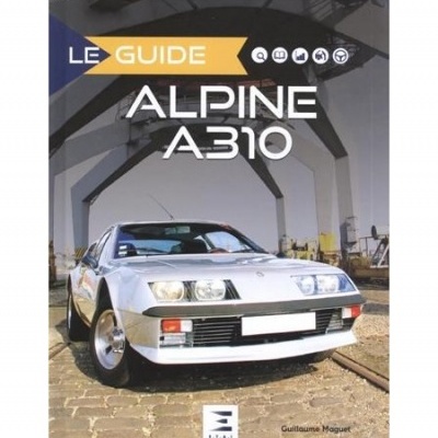 Livro Le Guide Alpine A310 com imagem de carro desportivo prateado em pavimento de pedra
