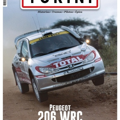 Capa de revista com carro de rali Peugeot 206 WRC a saltar na terra