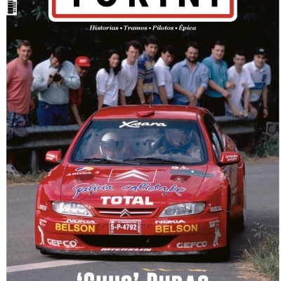 Capa da revista TURINI com carro de rali Citroën vermelho a passar numa estrada e espectadores ao fundo