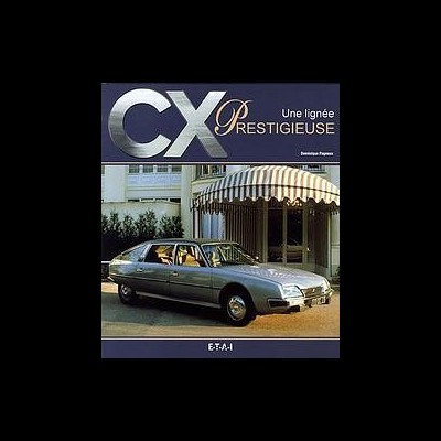 Capa de revista com carro clássico cinza em frente a casa com toldo listrado