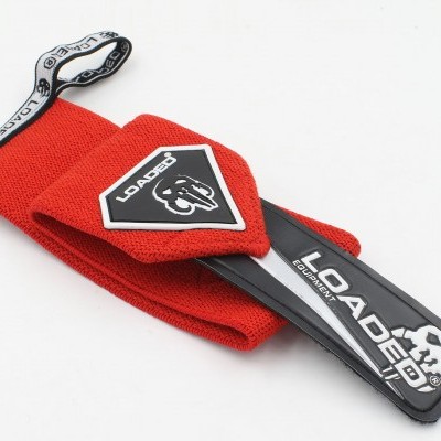 Faixa elástica vermelha com parte preta e etiquetas com texto LOADED e elefante branco