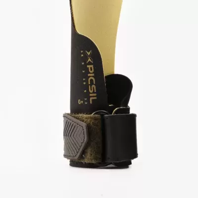 Shim com fixação de tecido castanho e parte em plástico preto para calcanhar com texto XPICSIL XL 9