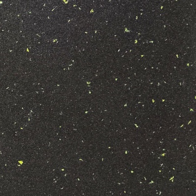 textura granulada preta com partículas verdes e brancas