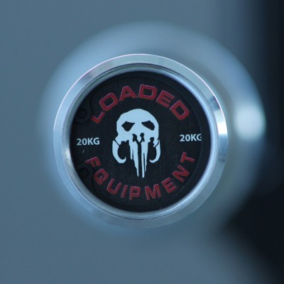 Extremidade de halter com etiqueta preta e logotipo de caveira