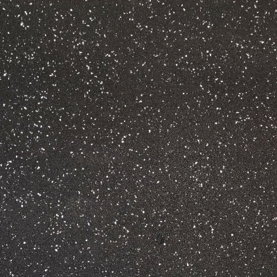 Superfície preta com pontos brancos irregulares