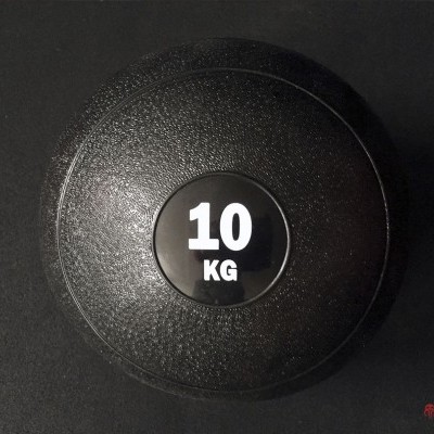 Disco de peso preto 10 kg sobre superfície preta com logótipo LOADDED