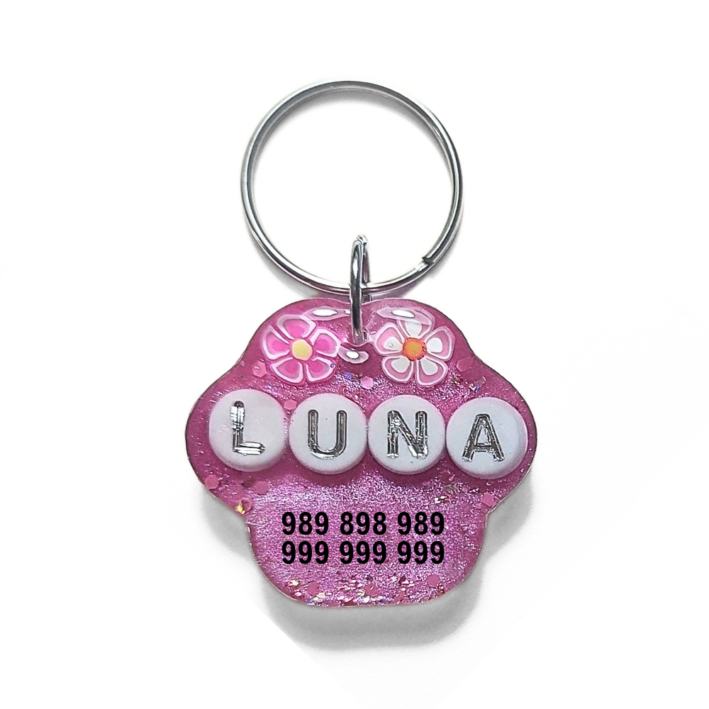 Chaveiro pet cor-de-rosa com nome e telefone